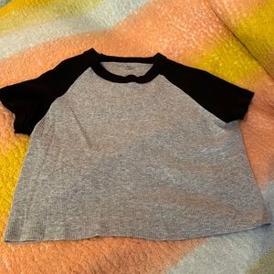 Small brandy Melville top. Black and heather grey. Softest material
